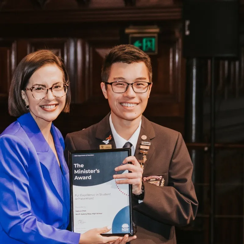 Joshua Chan receiving The NSW Minister's Award For Excellence in Student Achievement from Deputy Premier Prue Car